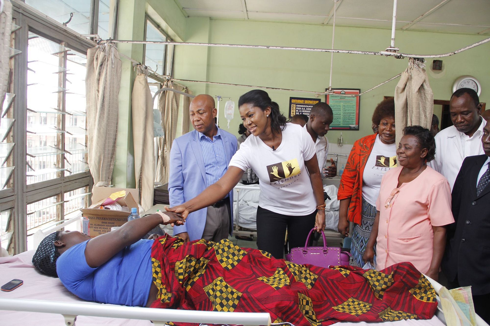Extended Hands team visiting a patient